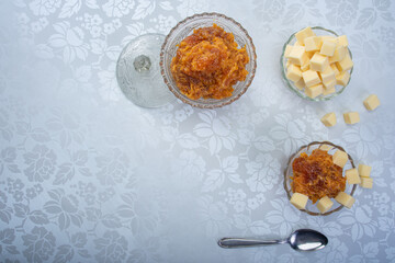 Pumpkin jam in a clear and minimalist arrangement, top view.