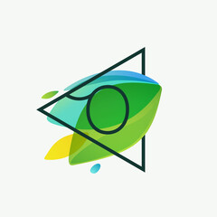 O letter logo in triangle frame at green leaves watercolor background.