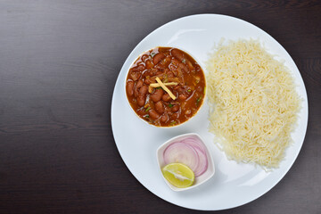 Rice and red kidney beans, rajma chawal, indian food on table