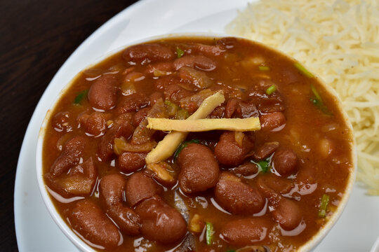 rajma, razma, kidney beans with ginger on top ofit with rice, close up, indian spice food, traditional food.