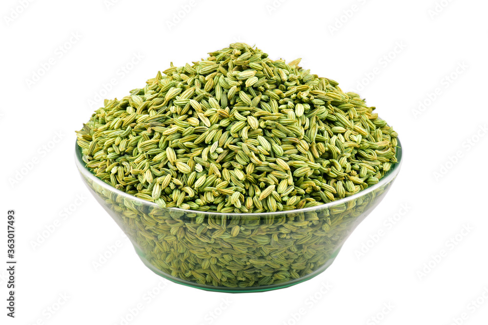 Wall mural green plant saunf fennel seeds in bowl isolated on white background, macro . - Wall murals