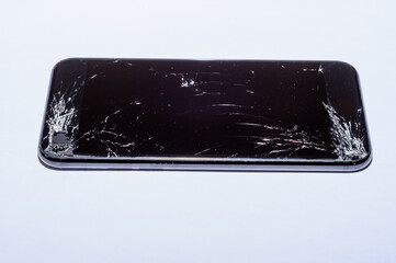 View on a cracked screen of a smartphone