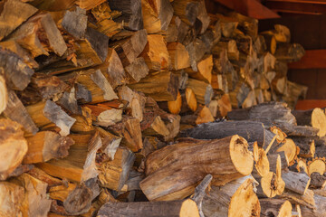 Firewood logs cut and ready for winter at a rural Colorado ranch home near Denver