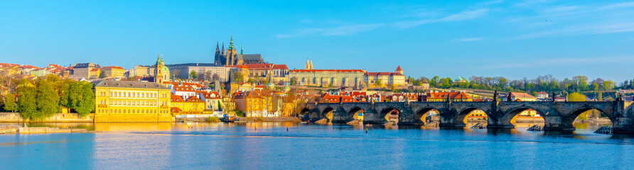 Fototapeta na wymiar Panoramic view of Prague Castle and Charles Bridge on sunny spring morning, Praha, Czech Republic