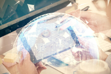 Double exposure of man's hands holding and using a phone and international business theme drawing.