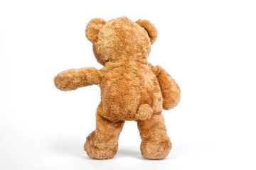 Teddy bear stopped on white background.