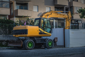 Excavator heavy machine construction site.