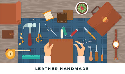 Workplace for handmade leather goods. Vector flat illustration. Table with tools and repairman hands