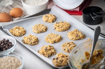 chocolate chip oatmeal cookie dough on iron pan