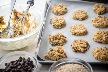 chocolate chip oatmeal cookie dough on iron pan