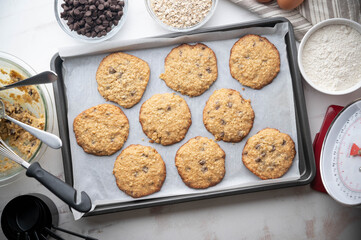 chocolate chip oatmeal cookie on iron pan