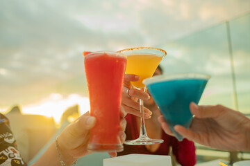 friend drinking cocktail and enjoying party, drink don't drive concept
