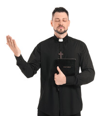 Handsome priest on white background
