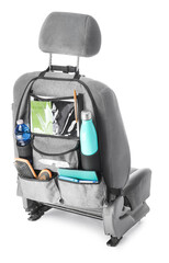 Travel organizer with different things on car seat against white background