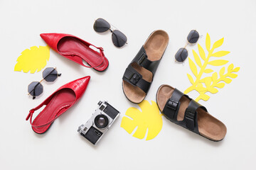 Composition with beach accessories on white background