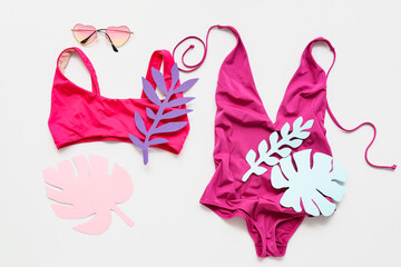 Composition with beach accessories on white background