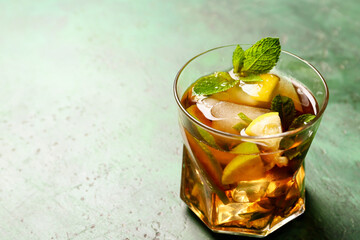 Glass of tasty Cuba Libre cocktail on table