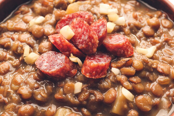 Bowl of tasty lentils soup, closeup