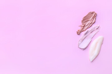 Samples of cream on color background