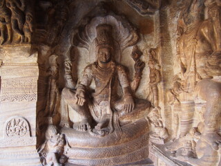 A stone statue dug into a rock, Cave Temples, Badami, Karnataka, South India, India