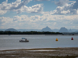 People Fishing in Boat on the Sea