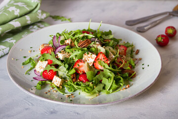 Strawberry and feta cheese salad. Healthy diet summer food. Horizontal image