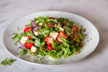 Strawberry and feta cheese salad. Healthy diet summer food. Horizontal image