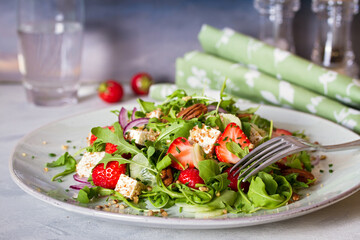 Strawberry and feta cheese salad. Healthy diet summer food. Horizontal image