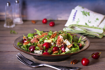 Strawberry and cured ham salad with gorgonzola cheese. Summer salad