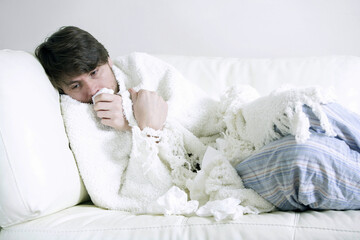 A Caucasian man bedridden
