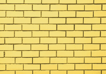 brick block wall of light yellow pastel color background
