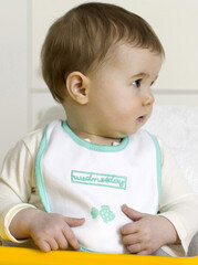 Baby girl wearing bib
