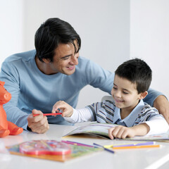 Father watching son doing homework