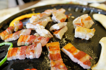 Korean grilled pork BBQ (Samgyeopsal-gui) at Korean restaurant, Busan, South Korea
