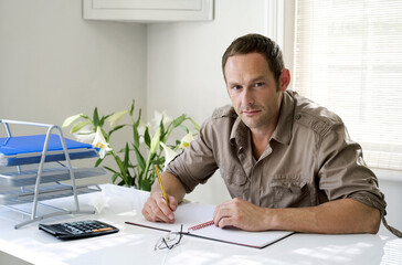 Man working at his desk in a home office
