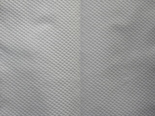 White color tissue paper textured background with folds
