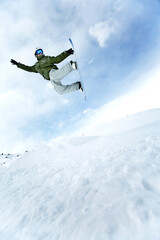 Male snowboarder in air
