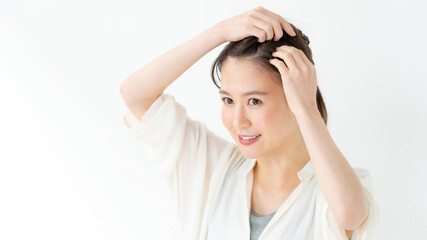 Obraz premium 髪の毛・分け目・生え際・女性