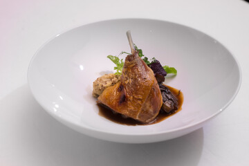 goose leg in red gravy sauce