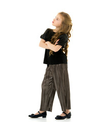 The little girl looks up.The concept of children's emotions.