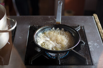 Boil soup in pan