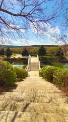 Fototapeta na wymiar stair path and bridge in spring in the park