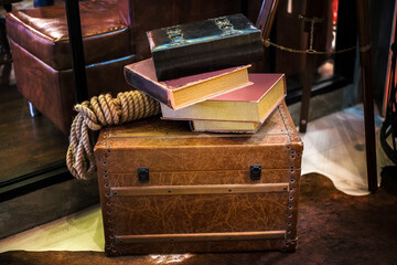 rustic books on old chest