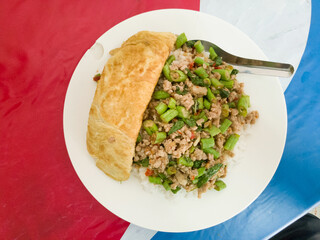 stir fried ground pork with sweet basil and omelet with rice