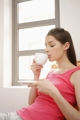 Woman drinking coffee