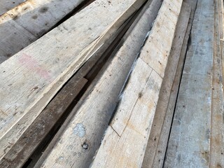 pile of big brown wood plank