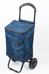 Galactic starry sky pattern supermarket shopping trolley bag, isolated on white background