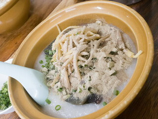 congee rice porridge on wooden table