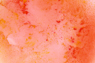 yellow and red paint in water