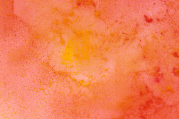 yellow and red paint in water